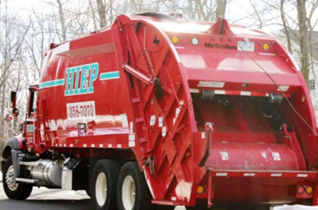 Various sizes of Hiep Sanitation dumpsters lined up in a commercial area of Rockland County, NY, highlighting options suitable for businesses and large scale projects.